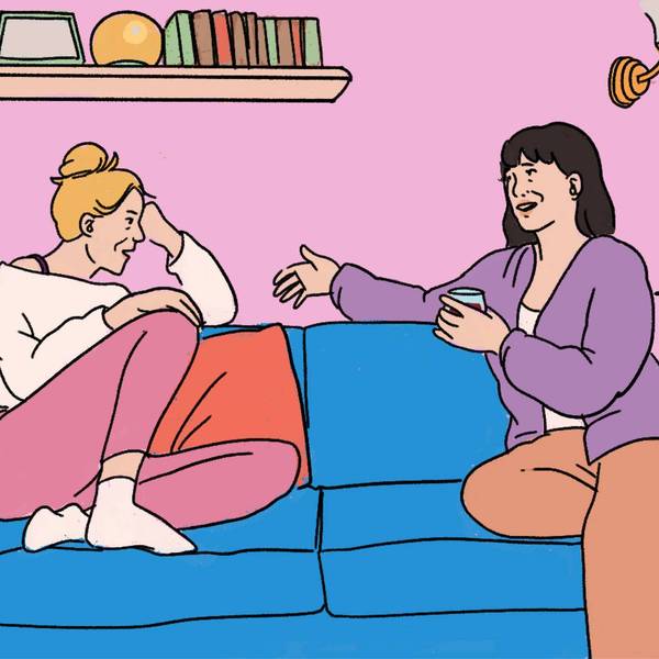 women talking on the couch