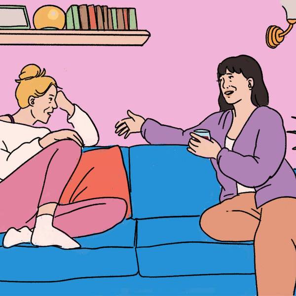 women talking on the couch