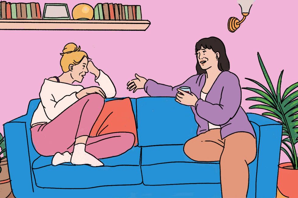 women talking on the couch