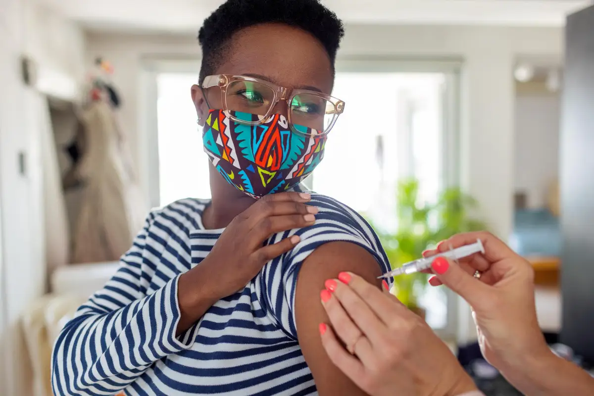 Young Woman Receiving Coronavirus Vaccine