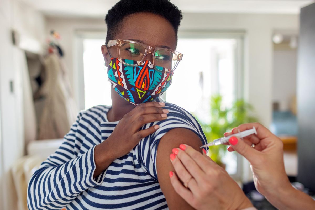 Young Woman Receiving Coronavirus Vaccine