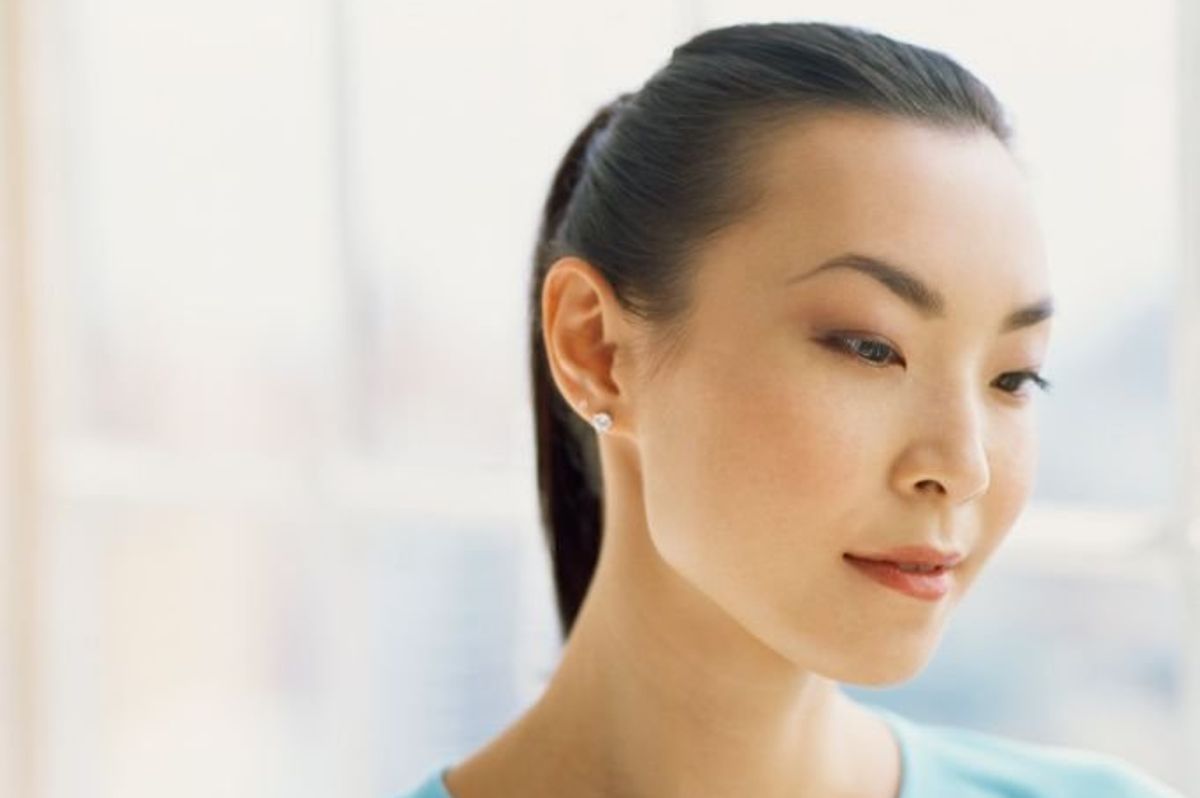 young woman suffering from fibromyalgia