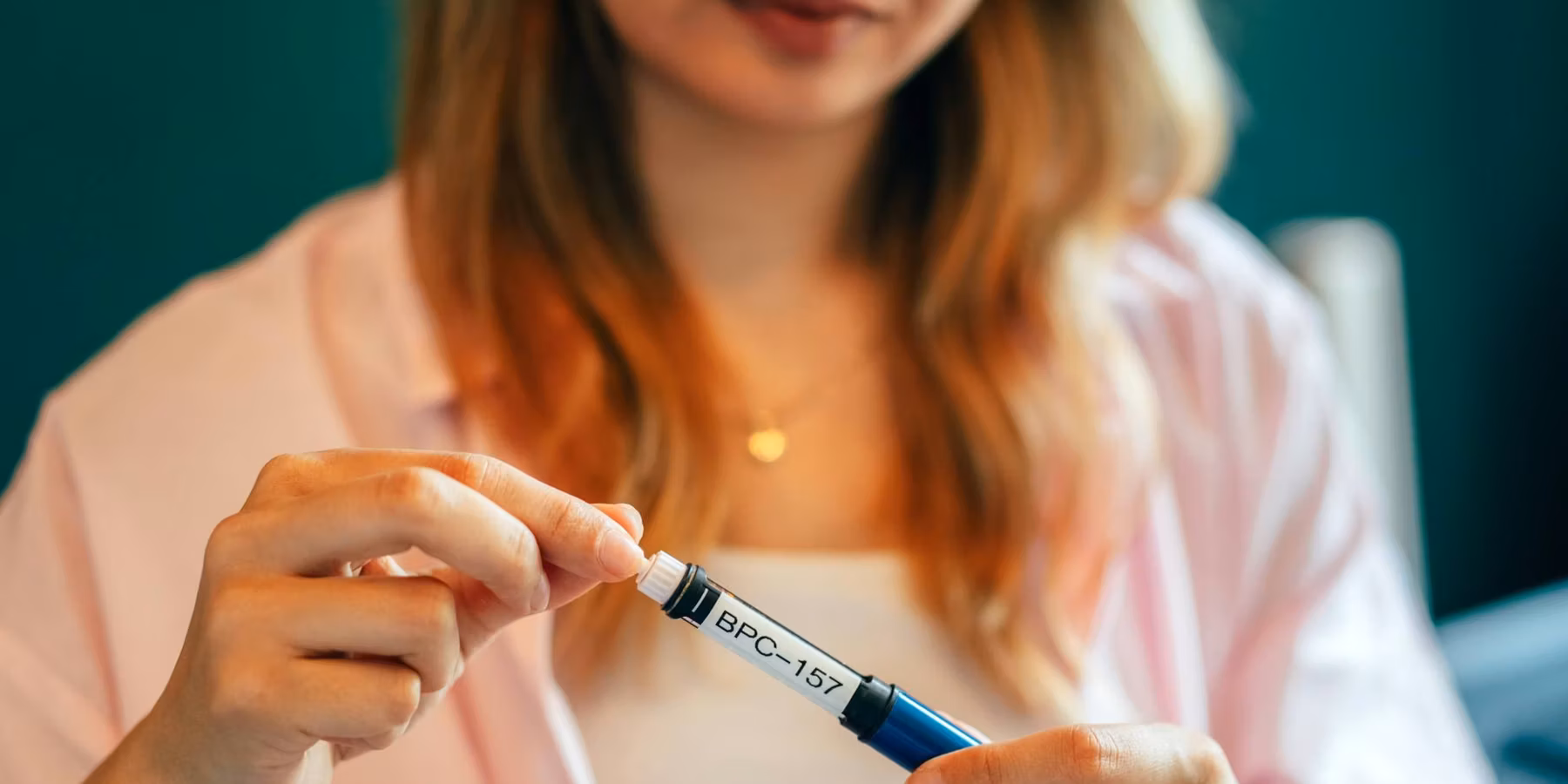 Young Woman Using BPC-157 Peptide Injection at Home