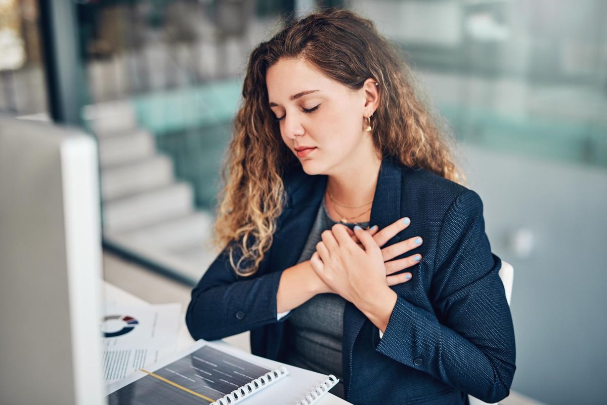 young woman with chest pains